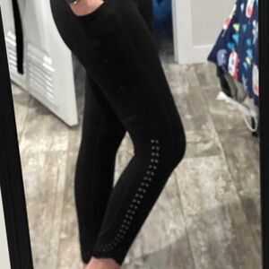 Sleek Black Women's Leggings with Eyelet Detail